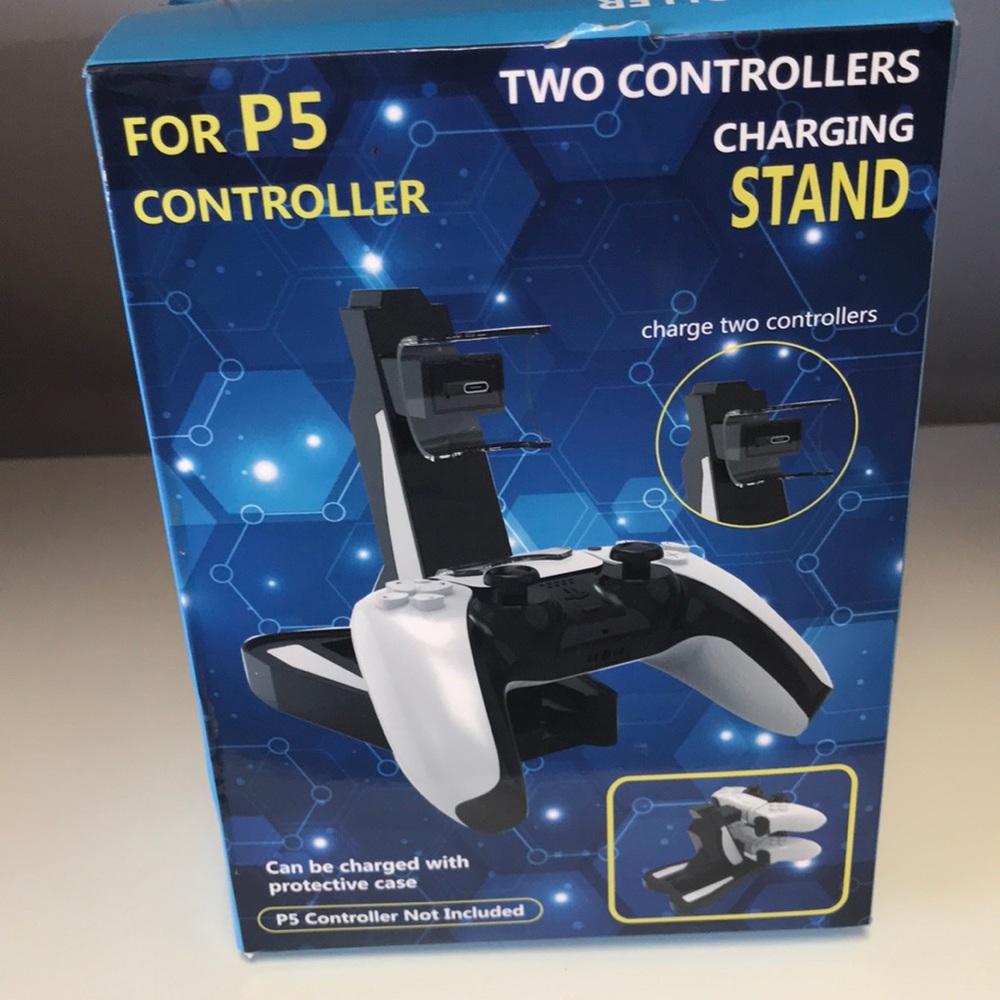 two controllers charging satand for PlayStation